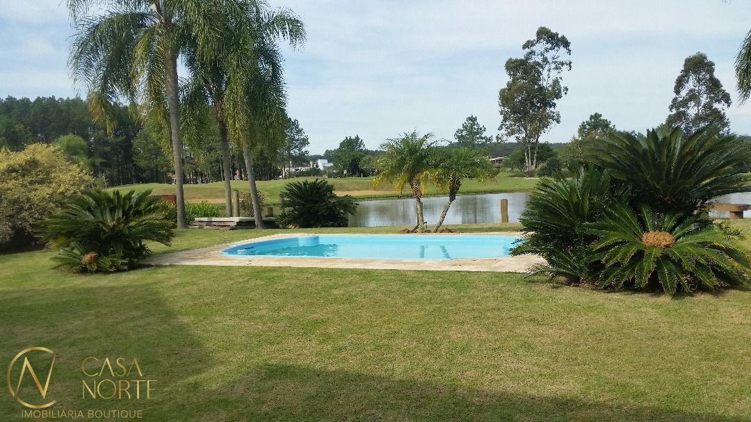 Casa de Condomínio à venda com 4 quartos, 596m², 4 suítes, 5 vagas, Avenida Juca Batista no bairro Belém Novo em Porto Alegre