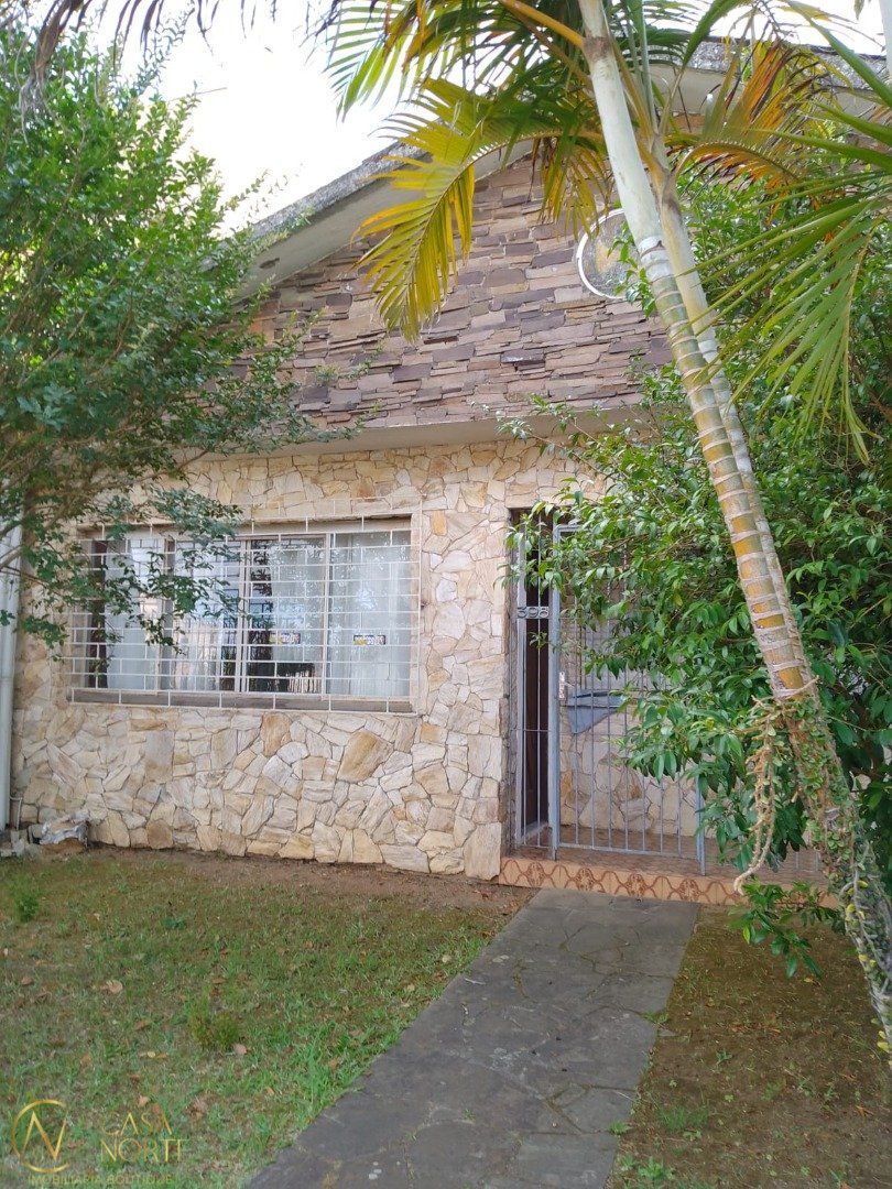 Casa à venda com 3 quartos, 114m², 1 vaga, Rua Mata Coelho no bairro Nonoai em Porto Alegre