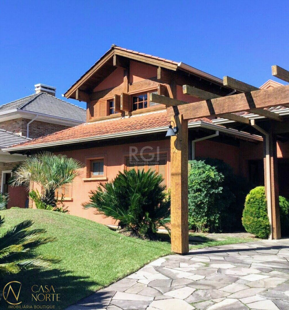 Casa de Condomínio à venda com 4 quartos, 596m², 4 suítes, 5 vagas, Avenida Juca Batista no bairro Belém Novo em Porto Alegre