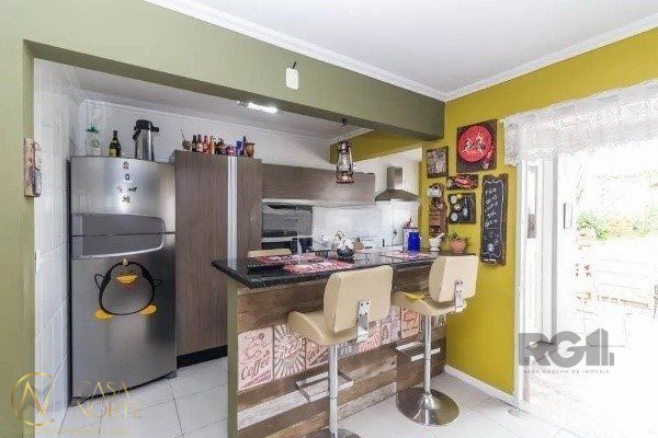 Casa à venda com 3 quartos, 182m², 1 suíte, 2 vagas, Travessa Orion no bairro Cristo Redentor em Porto Alegre