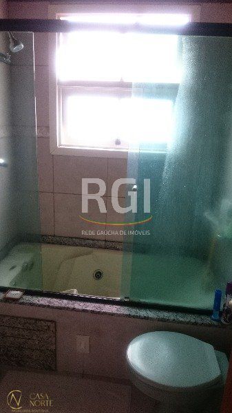 Casa de Condomínio à venda com 5 quartos, 350m², 1 suíte, 2 vagas, Avenida Juca Batista no bairro Cavalhada em Porto Alegre