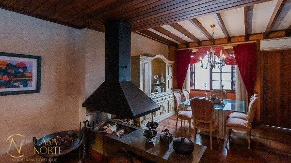 Casa de Condomínio à venda com 3 quartos, 291m², 1 suíte, 2 vagas, Rua Jaraguá no bairro Bela Vista em Porto Alegre