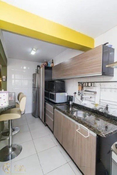 Casa à venda com 3 quartos, 182m², 1 suíte, 2 vagas, Travessa Orion no bairro Cristo Redentor em Porto Alegre