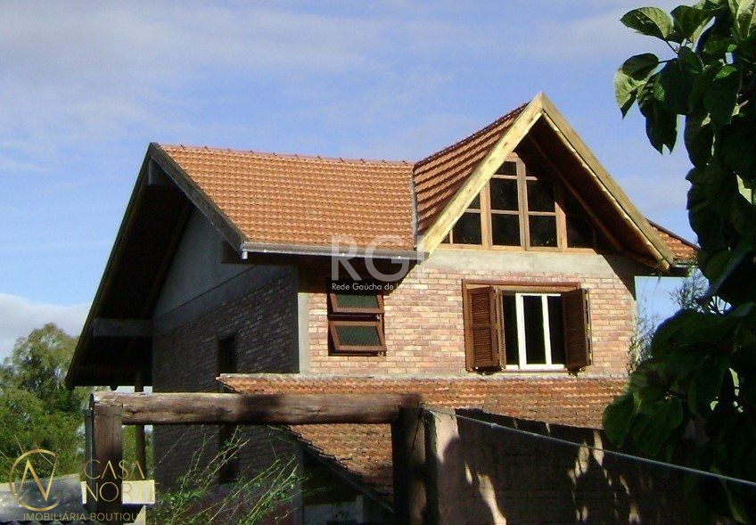 Casa à venda com 3 quartos, 130m², 1 suíte, 3 vagas, Rua Tapera no bairro Hípica em Porto Alegre
