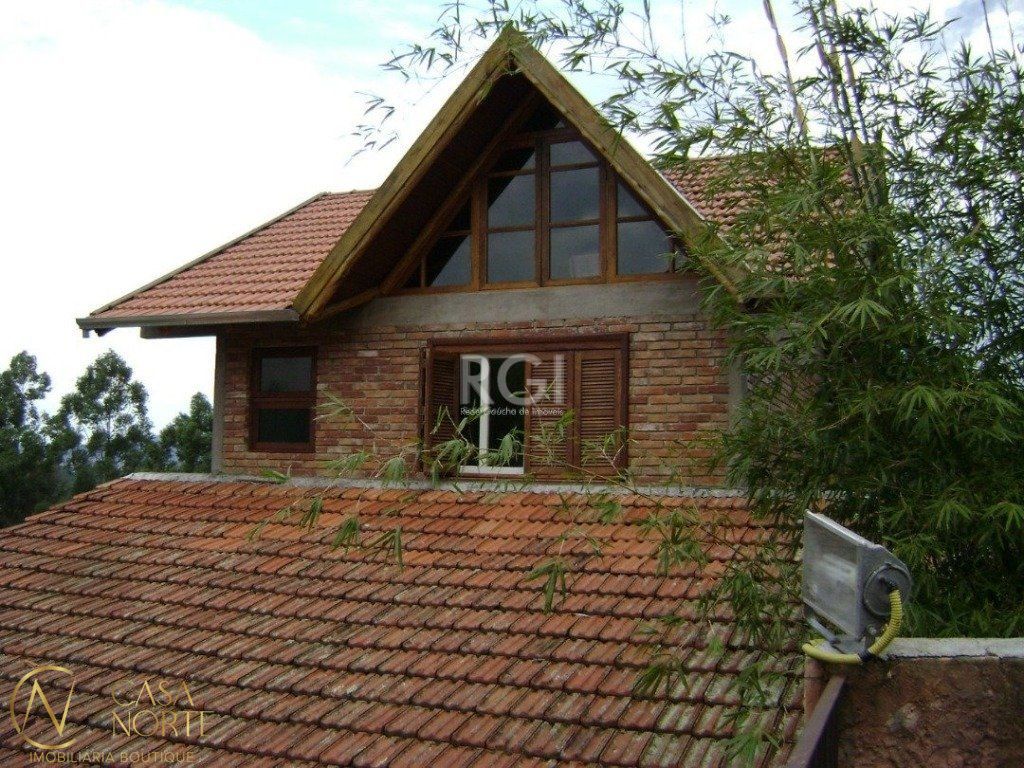 Casa à venda com 3 quartos, 130m², 1 suíte, 3 vagas, Rua Tapera no bairro Hípica em Porto Alegre