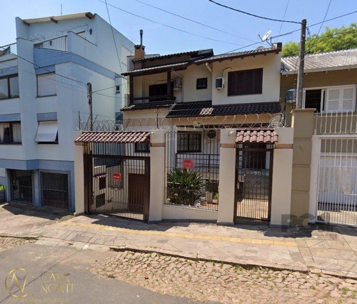 Casa à venda com 4 quartos, 264m², 1 suíte, 3 vagas, Rua Joaquim Cruz no bairro Santo Antônio em Porto Alegre