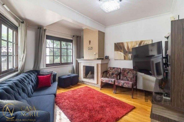 Casa à venda com 4 quartos, 264m², 1 suíte, 3 vagas, Rua Joaquim Cruz no bairro Santo Antônio em Porto Alegre