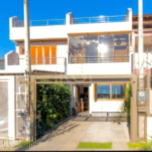 Casa à venda com 3 quartos, 120m², 3 suítes, 1 vaga, Rua Waldemar da Silva Tavares no bairro Guarujá em Porto Alegre