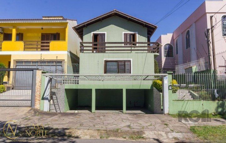 Casa de Condomínio à venda com 3 quartos, 158m², 2 vagas, Avenida Nilo Ruschel no bairro Morro Santana em Porto Alegre