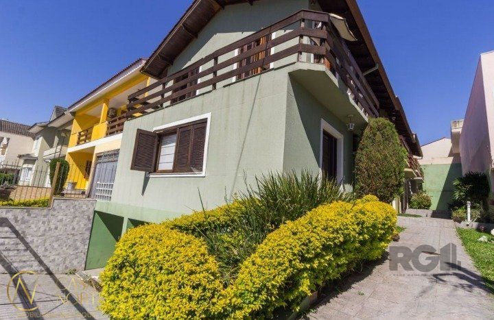Casa de Condomínio à venda com 3 quartos, 158m², 2 vagas, Avenida Nilo Ruschel no bairro Morro Santana em Porto Alegre