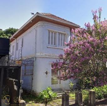 Casa à venda com 5 quartos, 415m², 3 vagas, Avenida Bastian no bairro Menino Deus em Porto Alegre