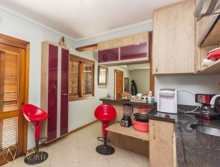 Casa de Condomínio à venda com 3 quartos, 158m², 2 vagas, Avenida Nilo Ruschel no bairro Morro Santana em Porto Alegre