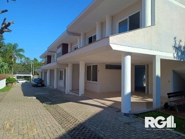 Casa de Condomínio à venda com 3 quartos, 205m², 1 suíte, 3 vagas, Avenida Coronel Marcos no bairro Pedra Redonda em Porto Alegre
