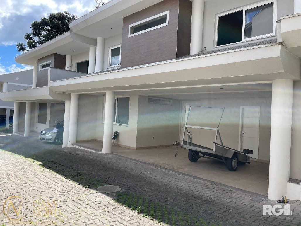 Casa de Condomínio à venda com 3 quartos, 166m², 1 suíte, 3 vagas, Avenida Coronel Marcos no bairro Pedra Redonda em Porto Alegre