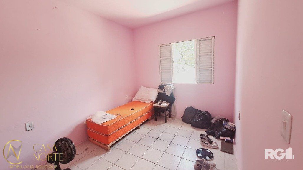 Casa à venda com 3 quartos, 90m², 5 vagas, Via de Acesso Vinte e Um no bairro Jardim Carvalho em Porto Alegre