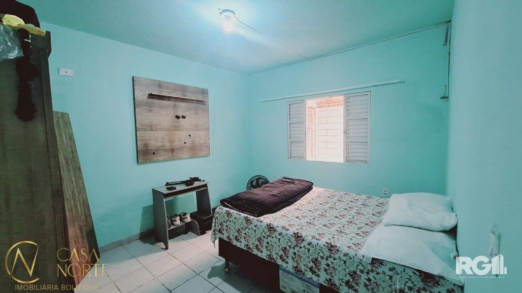Casa à venda com 3 quartos, 90m², 5 vagas, Via de Acesso Vinte e Um no bairro Jardim Carvalho em Porto Alegre