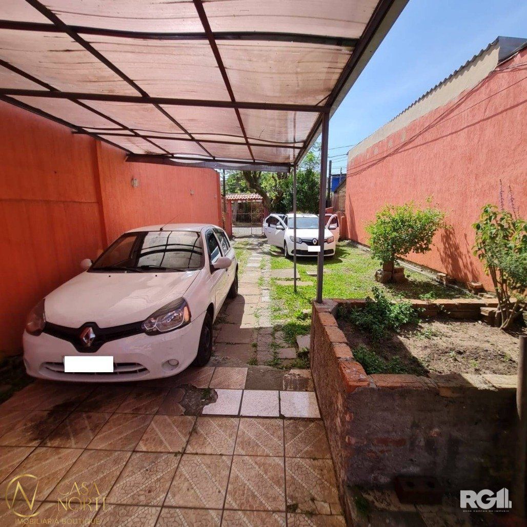 Casa à venda com 4 quartos, 172m², 3 vagas, Rua Lima no bairro Vila João Pessoa em Porto Alegre