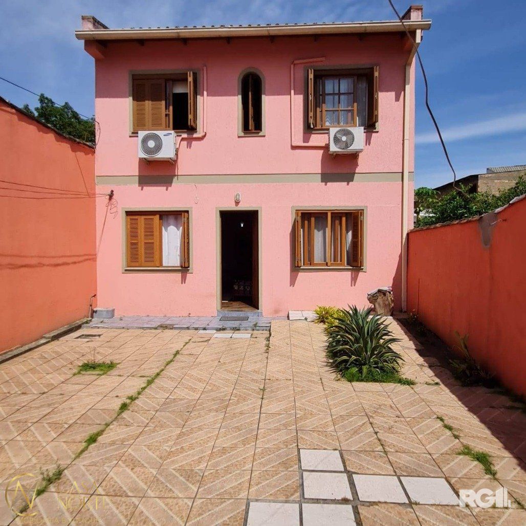 Casa à venda com 4 quartos, 172m², 3 vagas, Rua Lima no bairro Vila João Pessoa em Porto Alegre