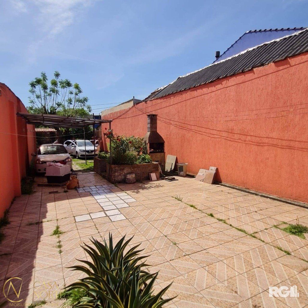 Casa à venda com 4 quartos, 172m², 3 vagas, Rua Lima no bairro Vila João Pessoa em Porto Alegre