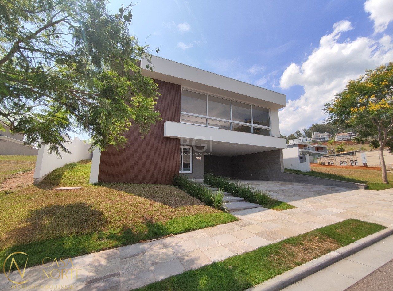 Casa de Condomínio à venda com 3 quartos, 310m², 3 suítes, 2 vagas, Estrada das Três Meninas no bairro Alphaville em Porto Alegre