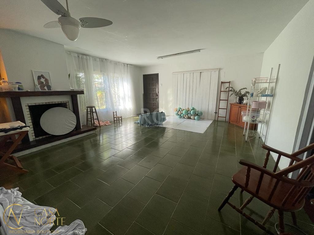 Casa à venda com 5 quartos, 400m², 3 suítes, 4 vagas, Rua Engenheiro Tito Marques Fernandes no bairro Ipanema em Porto Alegre