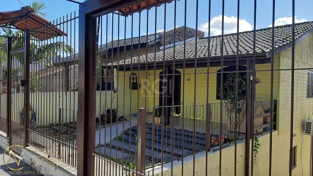 Casa à venda com 3 quartos, 2 vagas, Rua Jair de Moura Calixto no bairro Ipanema em Porto Alegre