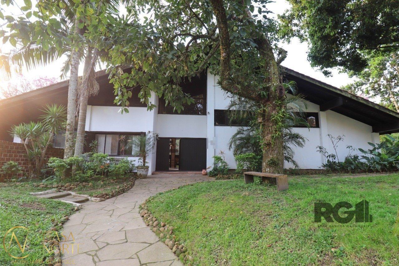 Casa à venda com 6 quartos, 523m², 2 suítes, 2 vagas, Rua Padre João Batista Reus no bairro Vila Conceição em Porto Alegre