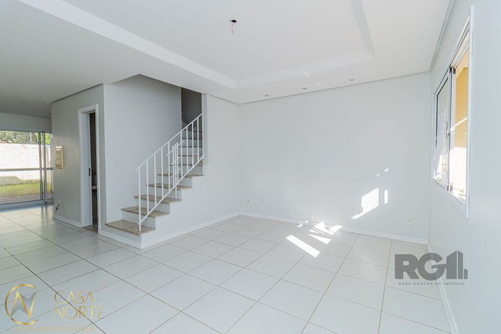 Casa de Condomínio à venda com 3 quartos, 86m², 1 suíte, 2 vagas, Estrada João Salomoni no bairro Vila Nova em Porto Alegre