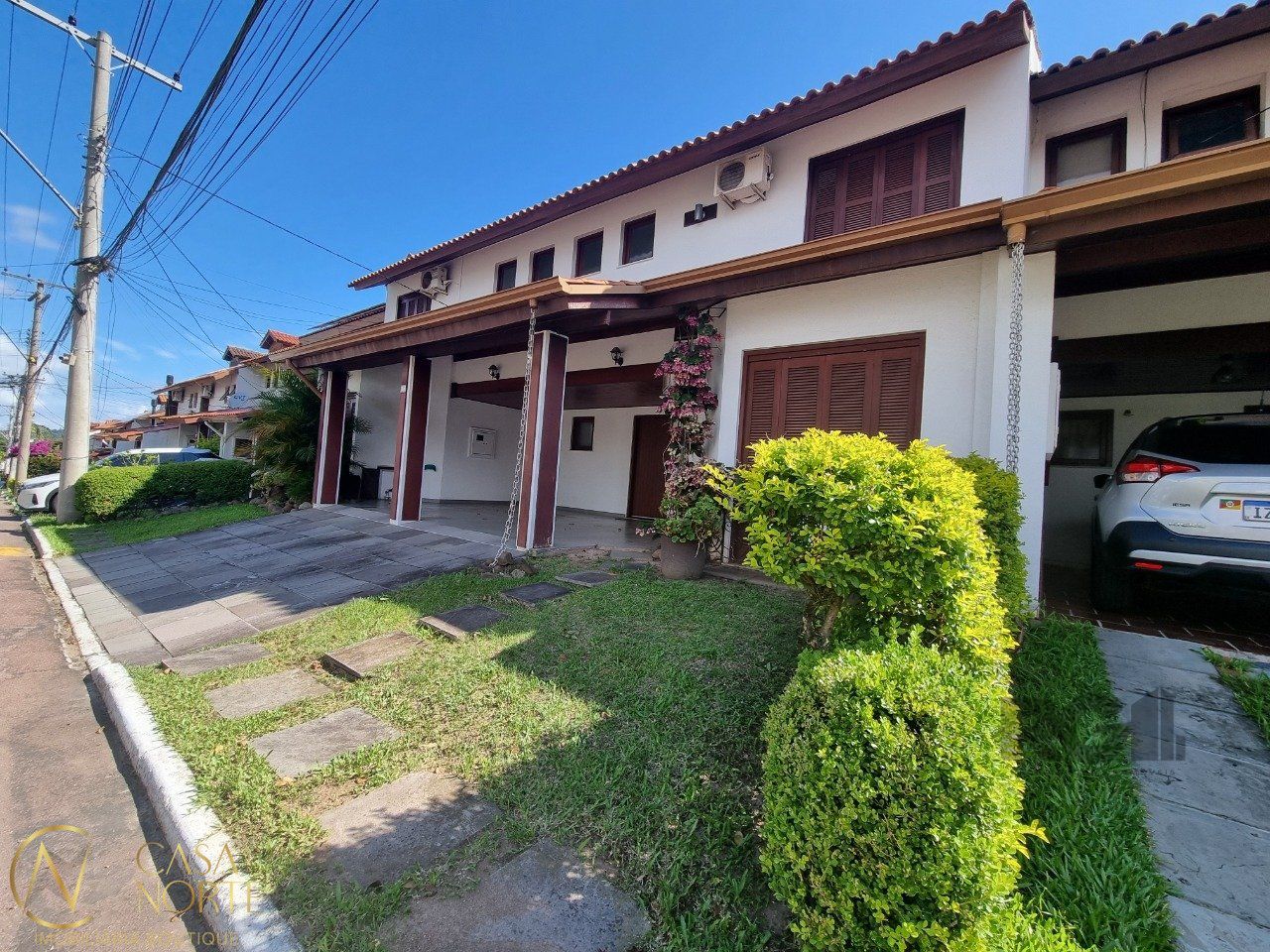 Casa de Condomínio à venda com 5 quartos, 217m², 1 suíte, 4 vagas, Avenida Eduardo Prado no bairro Cavalhada em Porto Alegre