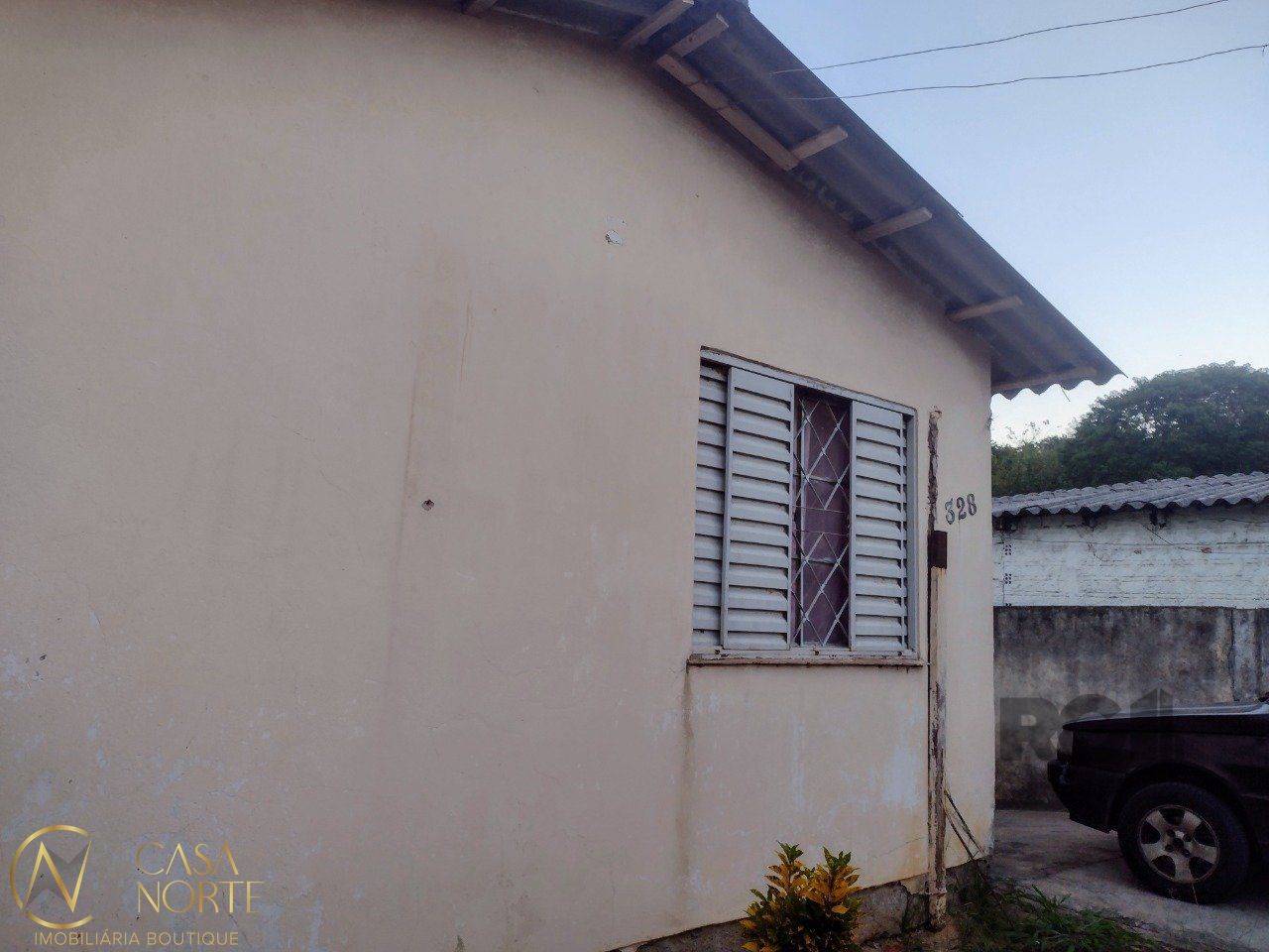 Casa à venda com 1 quarto, 128m², 2 vagas, Rua Ênio de Souza no bairro Vila Nova em Porto Alegre