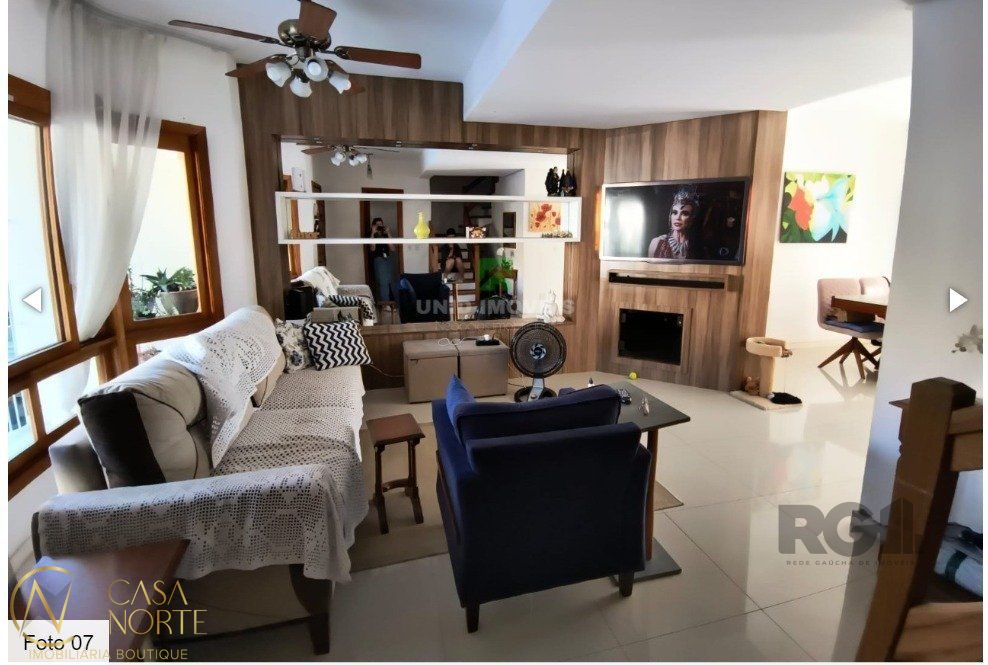 Casa à venda com 3 quartos, 142m², 2 vagas, Rua Alexandre de Gusmão no bairro Hípica em Porto Alegre