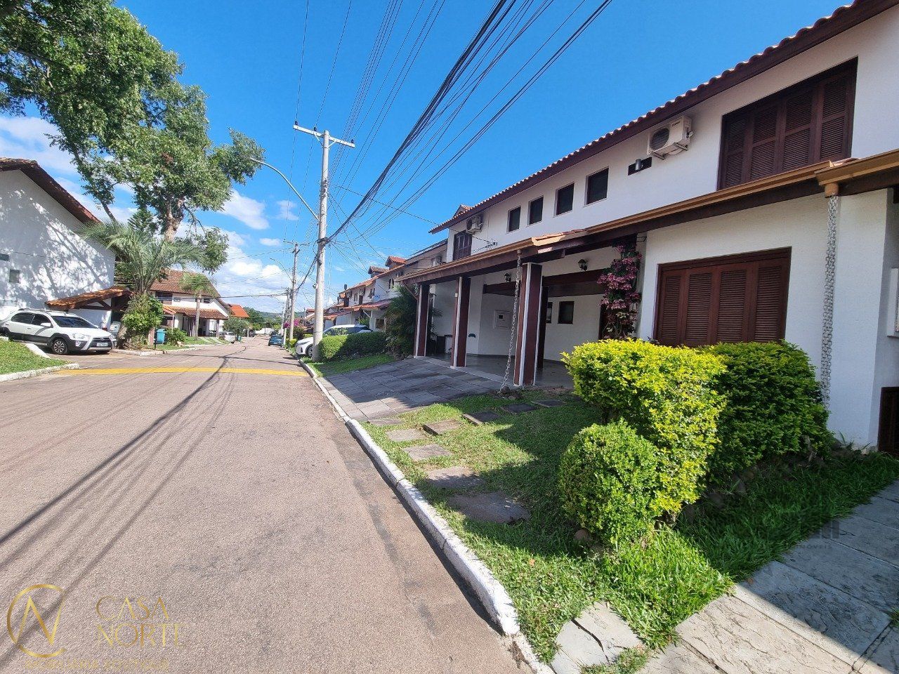 Casa de Condomínio à venda com 5 quartos, 217m², 1 suíte, 4 vagas, Avenida Eduardo Prado no bairro Cavalhada em Porto Alegre