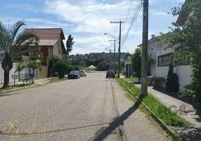 Casa à venda com 3 quartos, 142m², 2 vagas, Rua Alexandre de Gusmão no bairro Hípica em Porto Alegre