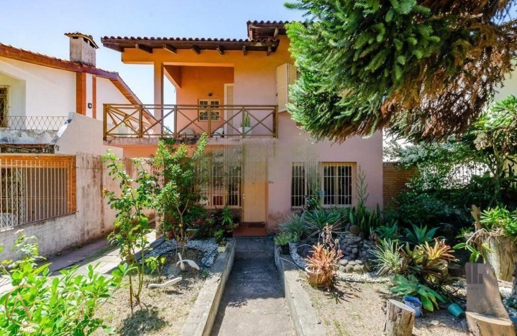 Casa à venda com 6 quartos, 408m², 1 suíte, 6 vagas, Rua Padre João Batista Reus no bairro Vila Conceição em Porto Alegre