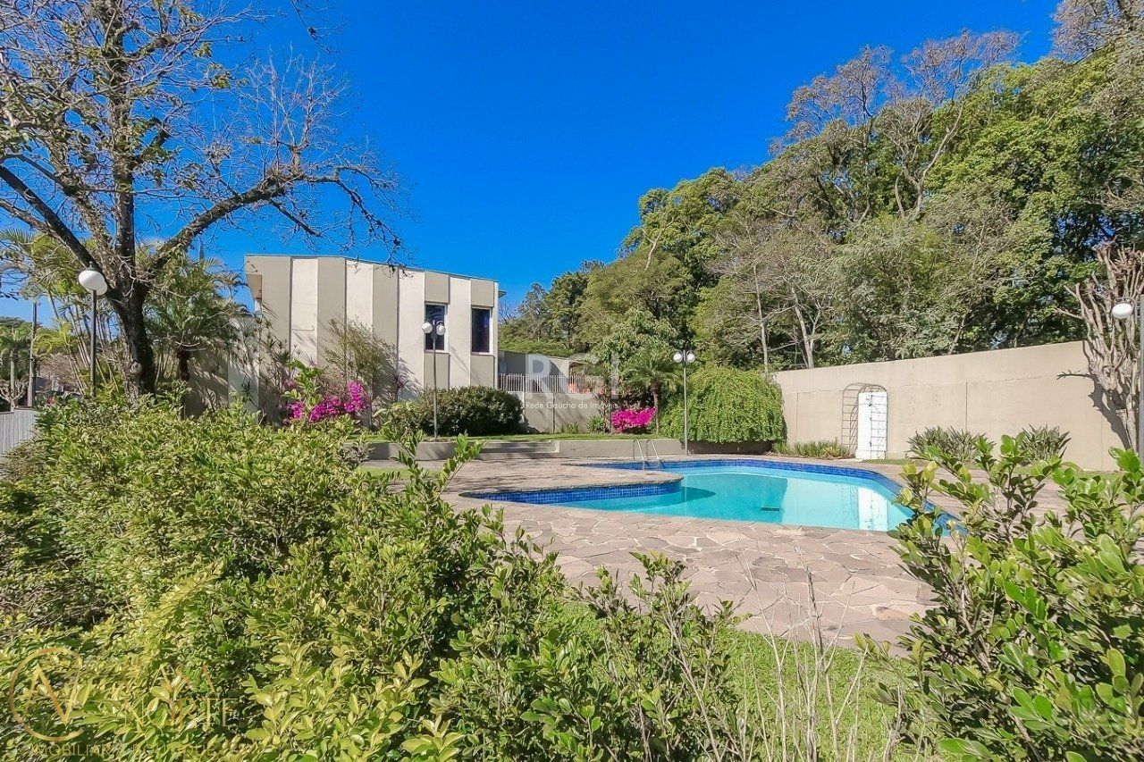 Casa de Condomínio à venda com 4 quartos, 187m², 1 suíte, 2 vagas, Avenida Coronel Marcos no bairro Pedra Redonda em Porto Alegre