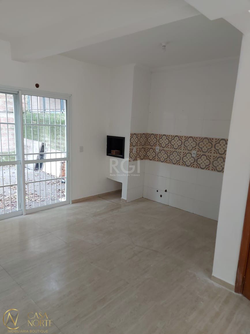 Casa à venda com 2 quartos, 107m², 1 suíte, 1 vaga, Avenida Vereador Roberto Landell de Moura no bairro Campo Novo em Porto Alegre