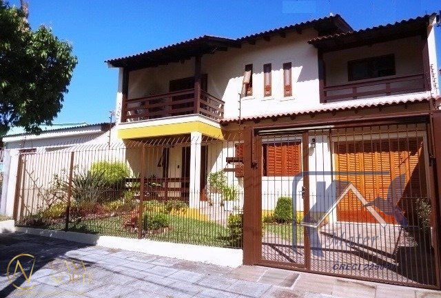 Casa à venda com 4 quartos, 318m², 1 suíte, 4 vagas, Avenida José Correa da Silva no bairro Cavalhada em Porto Alegre