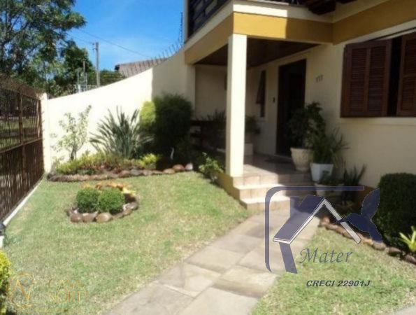 Casa à venda com 4 quartos, 318m², 1 suíte, 4 vagas, Avenida José Correa da Silva no bairro Cavalhada em Porto Alegre