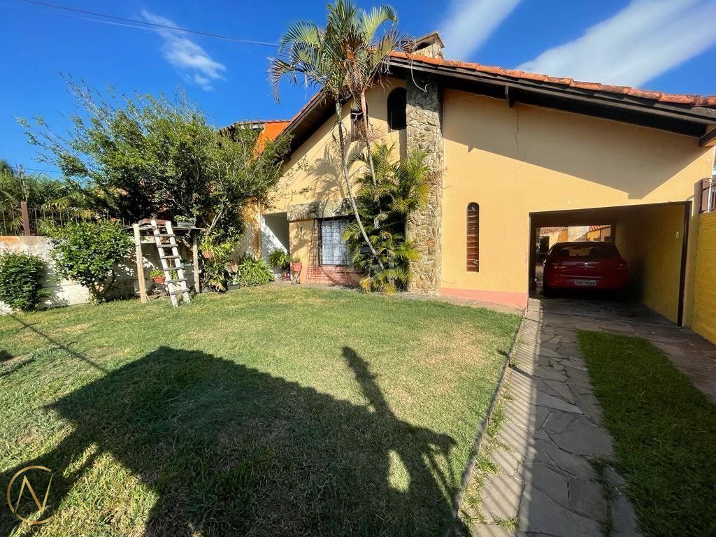 Casa à venda com 5 quartos, 400m², 3 suítes, 4 vagas, Rua Engenheiro Tito Marques Fernandes no bairro Ipanema em Porto Alegre