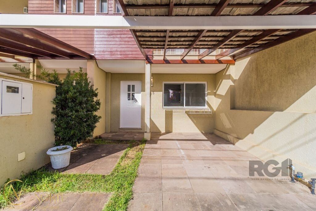 Casa de Condomínio à venda com 3 quartos, 86m², 1 suíte, 2 vagas, Estrada João Salomoni no bairro Vila Nova em Porto Alegre