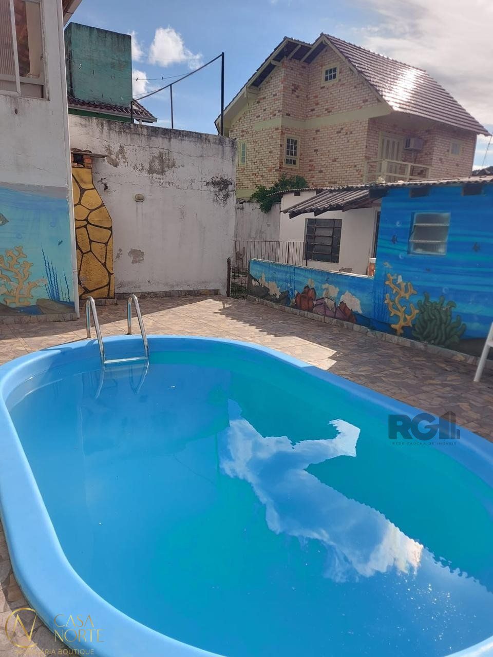 Casa à venda com 4 quartos, 269m², 1 suíte, 2 vagas, Rua Júlio Dias de Souza no bairro Aberta dos Morros em Porto Alegre