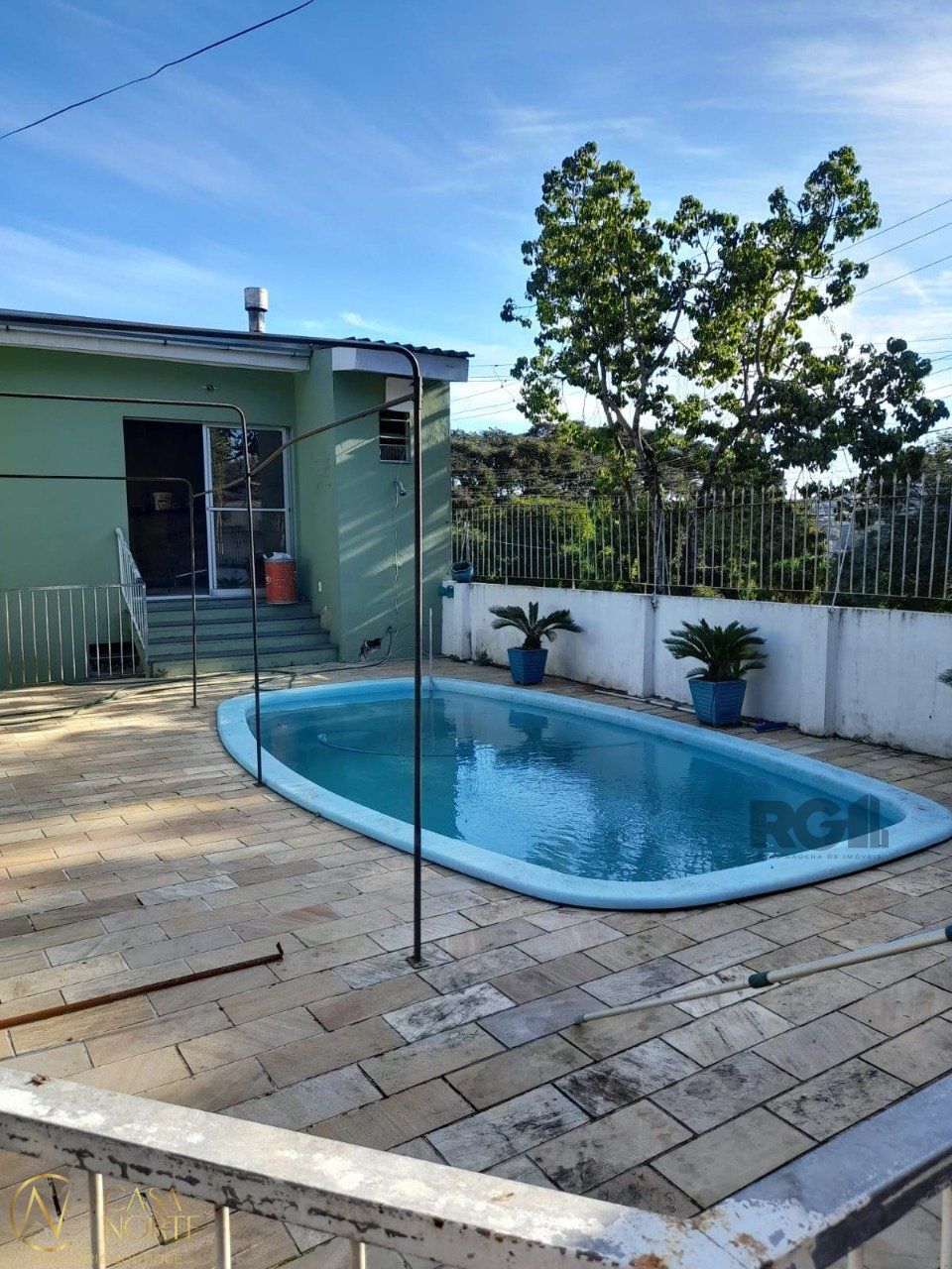 Casa à venda com 3 quartos, 104m², 1 vaga, Rua Acesso dos Hibiscos no bairro Santa Tereza em Porto Alegre