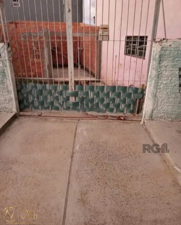 Terreno à venda  com 104m², Rua K no bairro Restinga em Porto Alegre