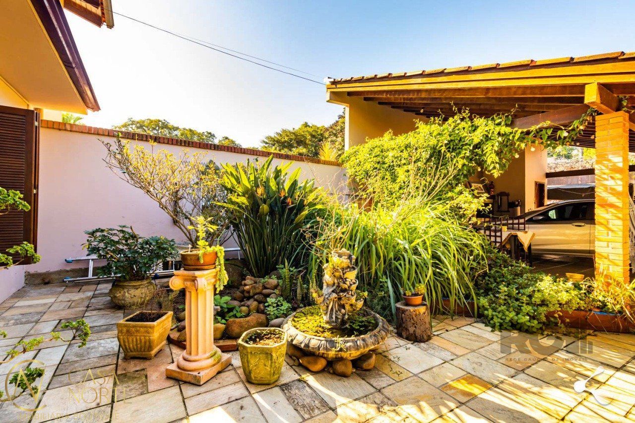 Casa à venda com 4 quartos, 200m², 3 suítes, 2 vagas, Avenida Imperial no bairro Ipanema em Porto Alegre