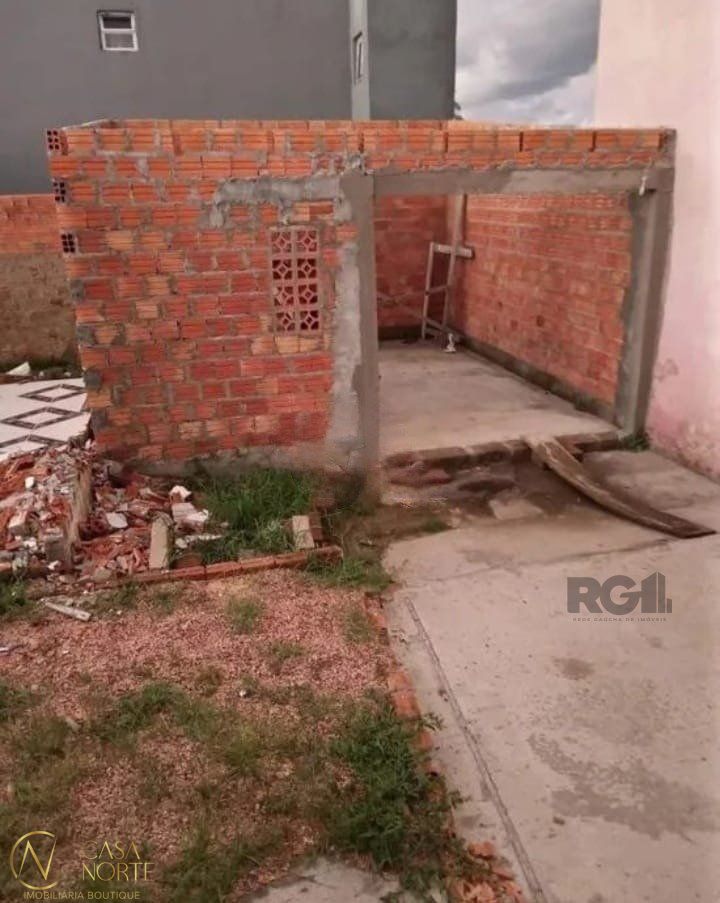 Terreno à venda  com 104m², Rua K no bairro Restinga em Porto Alegre