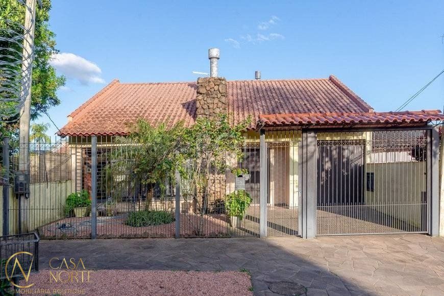 Casa à venda com 3 quartos, 195m², 1 suíte, 2 vagas, Rua Atlântida no bairro Ipanema em Porto Alegre