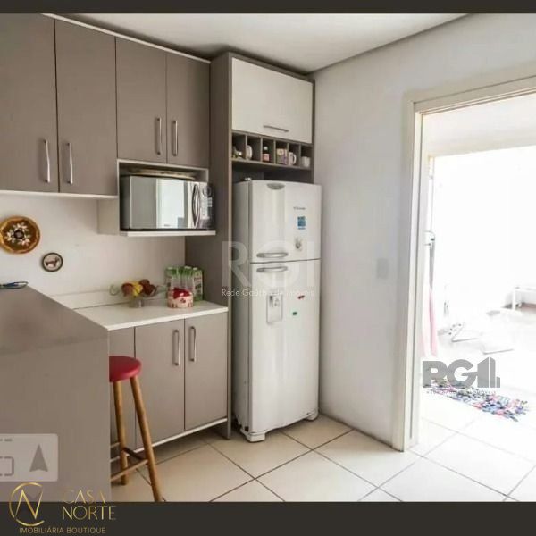 Casa de Condomínio à venda com 3 quartos, 152m², 1 suíte, 2 vagas, Rua Padre João Batista Reus no bairro Vila Conceição em Porto Alegre