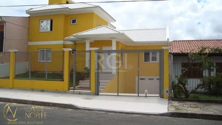 Casa à venda com 3 quartos, 250m², 1 suíte, 2 vagas, Rua Jerolomo Minuzo no bairro Vila Nova em Porto Alegre