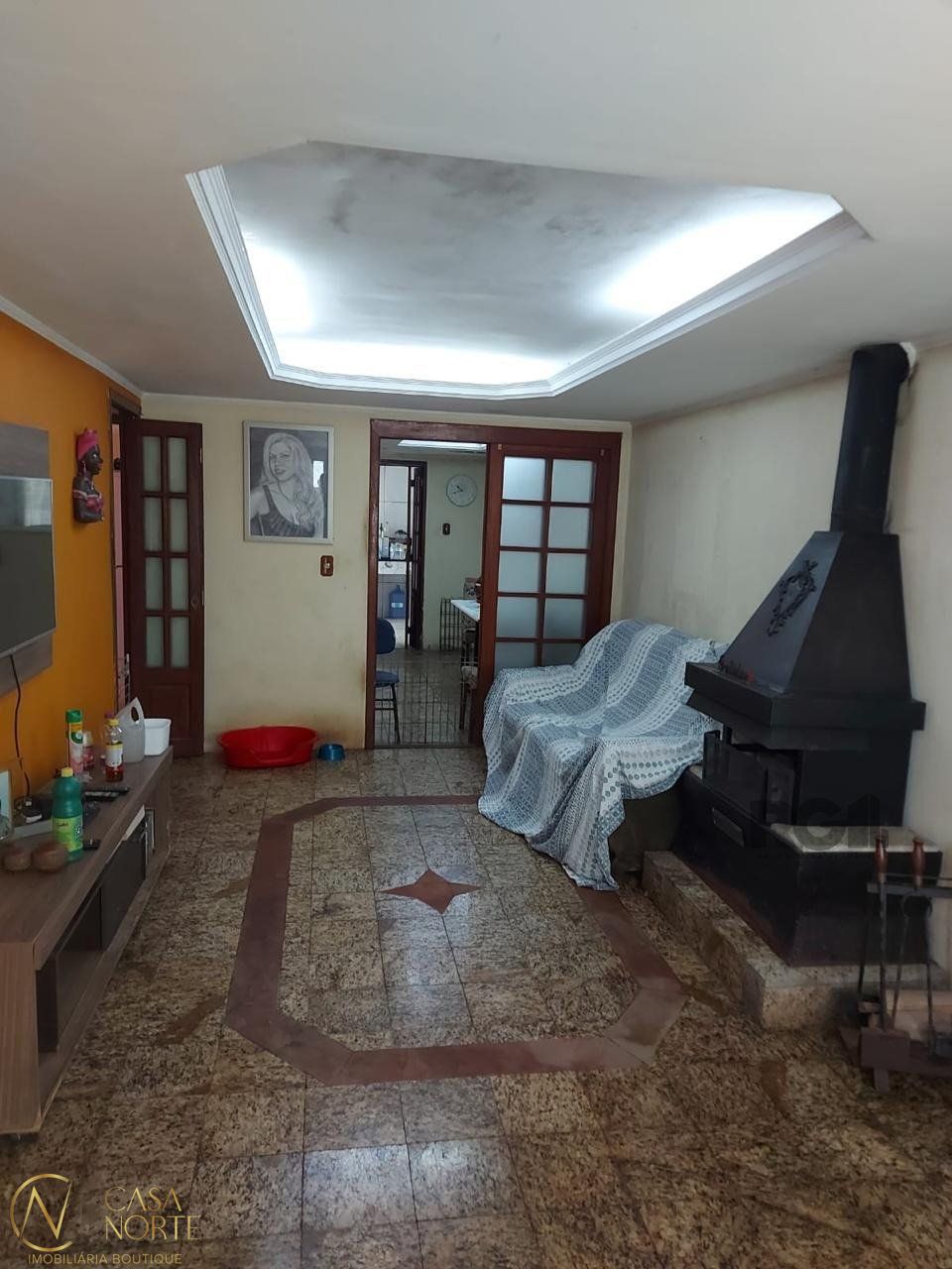 Casa à venda com 4 quartos, 269m², 1 suíte, 2 vagas, Rua Júlio Dias de Souza no bairro Aberta dos Morros em Porto Alegre