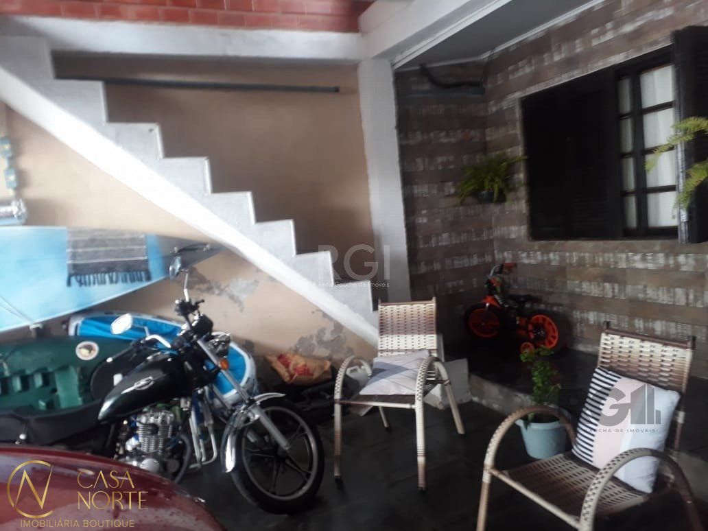 Casa à venda com 3 quartos, 90m², 1 suíte, 2 vagas, Rua Germano Bonow Filho no bairro Hípica em Porto Alegre